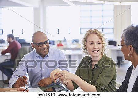 Business people talking in meeting View Large Photo Image Stock Image - Business people talking in meeting. Fotosearch