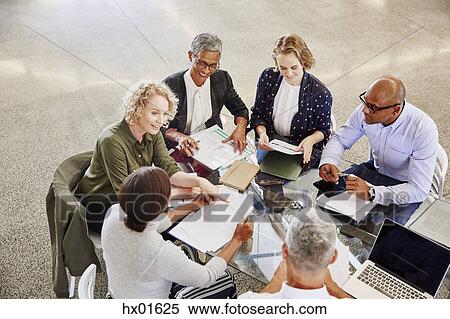 Business people talking in meeting View Large Photo Image Stock Photography - Business people talking in meeting. Fotosearch