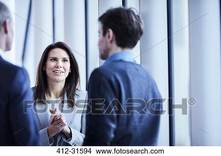 Picture - Business people talking. Fotosearch