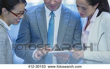 Business people using digital tablet View Large Photo Image Stock Image - Business people using digital tablet. Fotosearch