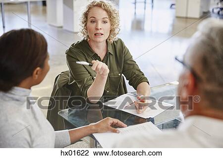 Businesswoman talking in meeting View Large Photo Image Stock Image - Businesswoman talking in meeting. Fotosearch
