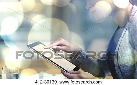 Businesswoman using digital tablet View Large Photo Image Stock Photo - Businesswoman using digital tablet. Fotosearch
