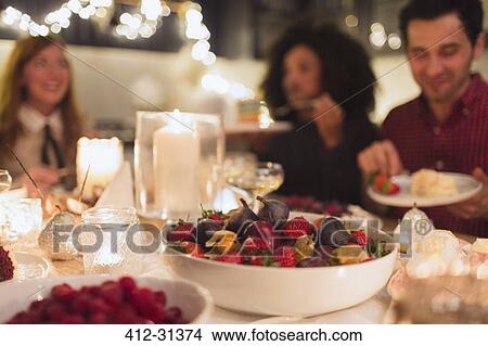 Candlelight Christmas dinner party View Large Photo Image Picture - Candlelight Christmas dinner party. Fotosearch