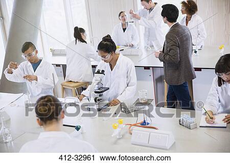 College students conducting scientific experiment in science laboratory classroom View Large Photo Image Stock Image - College students conducting scientific experiment in science laboratory classroom. Fotosearch