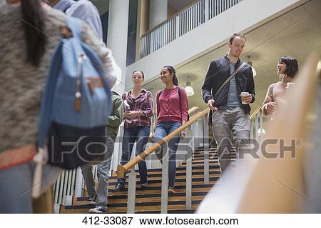 College students descending stairway View Large Photo Image Stock Photo - College students descending stairway. Fotosearch