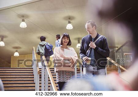 Stock Photograph - College students descending stairway. Fotosearch