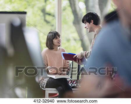 College students discussing homework View Large Photo Image Stock Image - College students discussing homework. Fotosearch