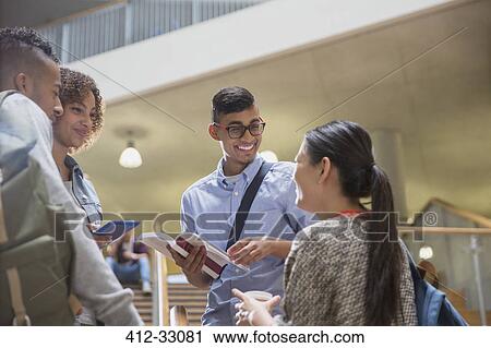 Stock Image - College students talking. Fotosearch