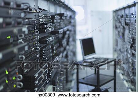 Stock Photo - Computer on cart in server room corridor. Fotosearch