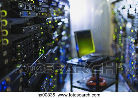 Stock Photography - Computer on cart in server room corridor. Fotosearch