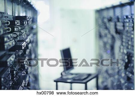 Computer on table in server room View Large Photo Image Stock Photo - Computer on table in server room. Fotosearch