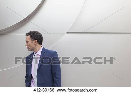 Stock Photograph - Corporate businessman looking away. Fotosearch