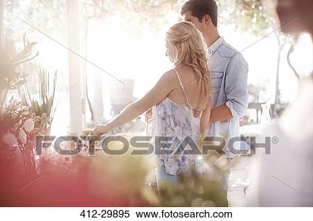 Customers shopping for flowers in flower shop View Large Photo Image Stock Photography - Customers shopping for flowers in flower shop. Fotosearch
