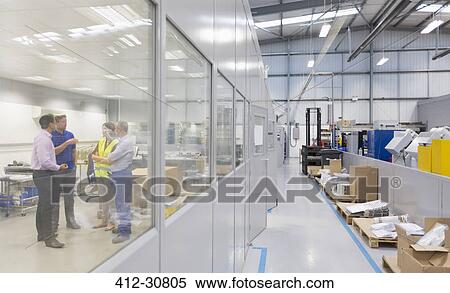 Engineers and managers talking in steel factory office View Large Photo Image Stock Photography - Engineers and managers talking in steel factory office. Fotosearch