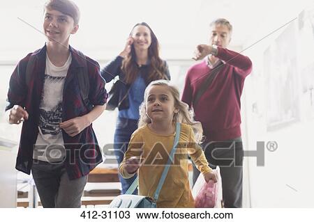 Family rushing to leave house View Large Photo Image Stock Image - Family rushing to leave house. Fotosearch