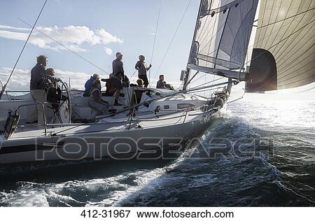Friends sailing on sunny ocean View Large Photo Image Stock Photo - Friends sailing on sunny ocean. Fotosearch
