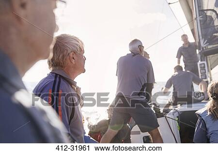 Stock Image - Friends sailing. Fotosearch