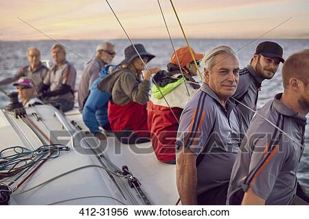 Stock Photograph - Friends sailing. Fotosearch