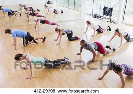 Stock Photo - High angle view of exercise class. Fotosearch