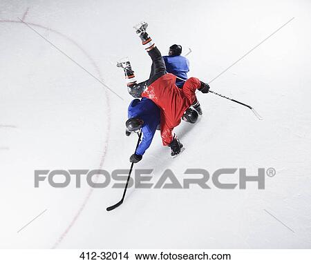 Hockey players colliding on ice View Large Photo Image Picture - Hockey players colliding on ice. Fotosearch