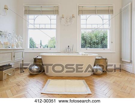 Home showcase interior bathtub and parquet floor View Large Photo Image Stock Image - Home showcase interior bathtub and parquet floor. Fotosearch