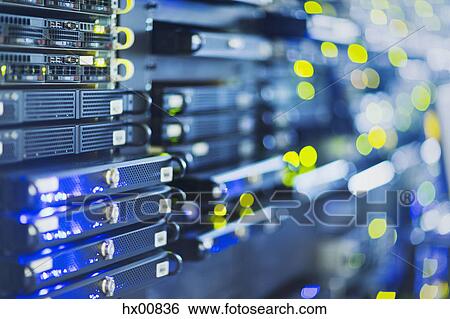 Stock Photograph - Illuminated server room panel. Fotosearch