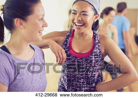 Laughing women in exercise class View Large Photo Image Stock Photo - Laughing women in exercise class. Fotosearch