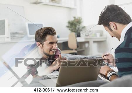 Male college students studying with laptop View Large Photo Image Stock Photo - Male college students studying with laptop. Fotosearch