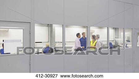 Managers and workers in steel factory office View Large Photo Image Stock Photo - Managers and workers in steel factory office. Fotosearch