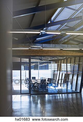 Stock Image - Modern empty conference room and office. Fotosearch