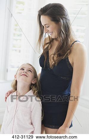 Stock Photo - Mother and daughter in bathroom. Fotosearch