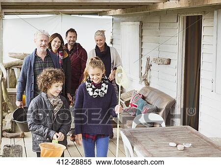 Multi-generation family with nets and bucket on porch View Large Photo Image Stock Photography - Multi-generation family with nets and bucket on porch. Fotosearch