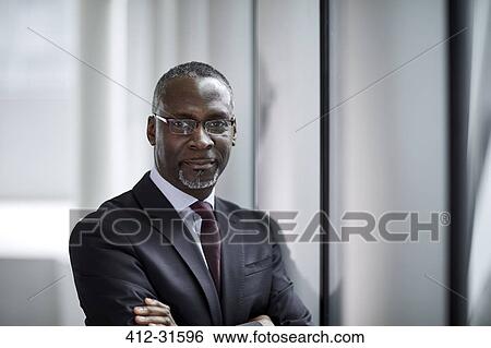 Portrait confident businessman View Large Photo Image Stock Photograph - Portrait confident businessman. Fotosearch