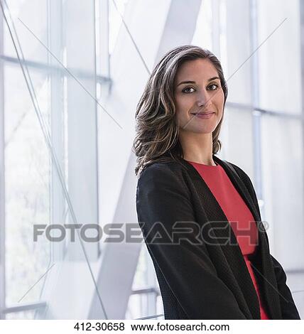 Stock Photo - Portrait confident corporate businesswoman. Fotosearch