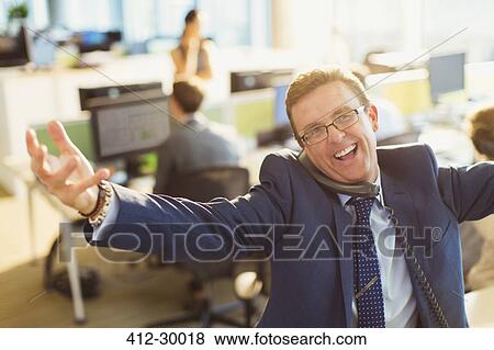 Portrait of exuberant businessman with arms outstretched talking on telephone View Large Photo Image Stock Photo - Portrait of exuberant businessman with arms outstretched talking on telephone. Fotosearch
