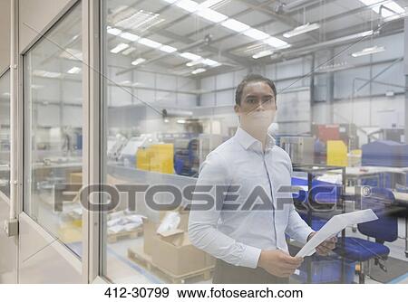 Portrait serious manager in steel factory View Large Photo Image Stock Photo - Portrait serious manager in steel factory. Fotosearch
