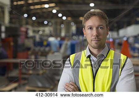 Picture - Portrait serious supervisor in steel factory. Fotosearch