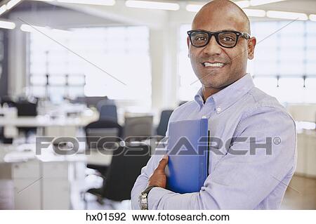 Portrait smiling businessman View Large Photo Image Stock Image - Portrait smiling businessman. Fotosearch