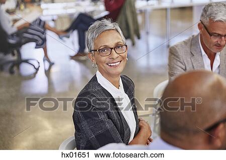 Portrait smiling businesswoman in meeting View Large Photo Image Stock Image - Portrait smiling businesswoman in meeting. Fotosearch
