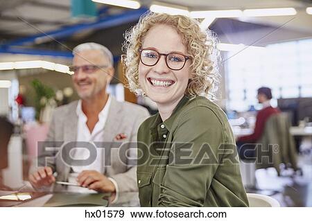 Portrait smiling businesswoman in meeting View Large Photo Image Stock Photo - Portrait smiling businesswoman in meeting. Fotosearch