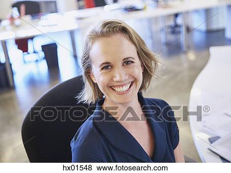Stock Photo - Portrait smiling businesswoman. Fotosearch