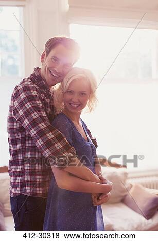 Portrait smiling couple hugging View Large Photo Image Stock Photo - Portrait smiling couple hugging. Fotosearch
