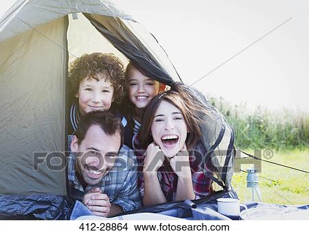Portrait smiling family in tent View Large Photo Image Picture - Portrait smiling family in tent. Fotosearch