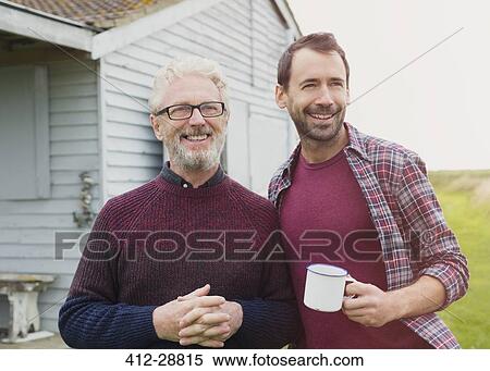 Portrait smiling father and son drinking coffee outside View Large Photo Image Stock Photography - Portrait smiling father and son drinking coffee outside. Fotosearch