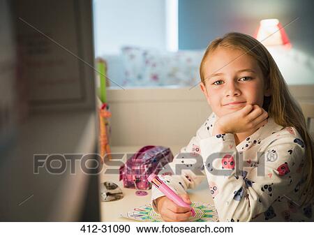 Portrait smiling girl coloring in bedroom View Large Photo Image Stock Image - Portrait smiling girl coloring in bedroom. Fotosearch