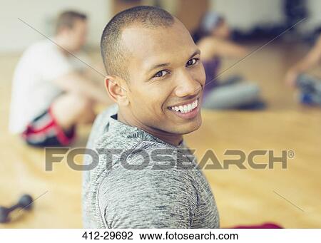 Portrait smiling man in exercise class View Large Photo Image Stock Image - Portrait smiling man in exercise class. Fotosearch