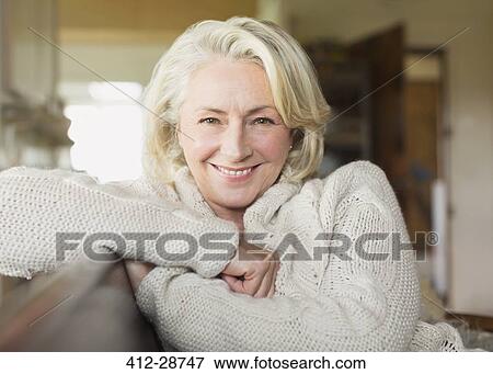 Portrait smiling senior woman in sweater View Large Photo Image Stock Photo - Portrait smiling senior woman in sweater. Fotosearch