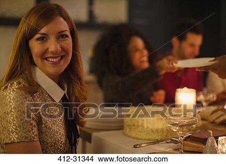 Portrait smiling woman at candlelight table View Large Photo Image Picture - Portrait smiling woman at candlelight table. Fotosearch