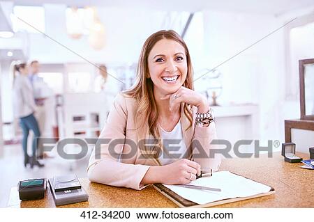 Portrait smiling woman working in jewelry store View Large Photo Image Stock Image - Portrait smiling woman working in jewelry store. Fotosearch