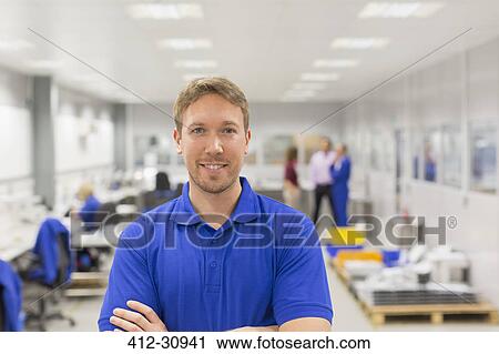 Portrait smiling worker in steel factory office View Large Photo Image Stock Image - Portrait smiling worker in steel factory office. Fotosearch